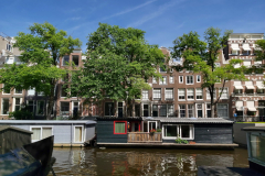 Husbåtar längs kanal Prinsengracht, Amsterdam.