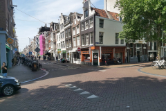 Vacker arkitektur längs den sista delen av kanal Prinsengracht, Amsterdam.