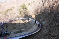 Första kurvan längs toboggan-banan, Mutianyu Great Wall.