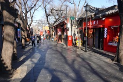 Gatuscen längs den mysiga gågatan, Beijing.