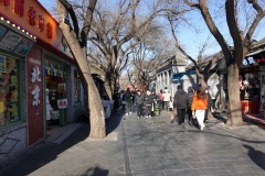 Gatuscen längs den mysiga gågatan, Beijing.
