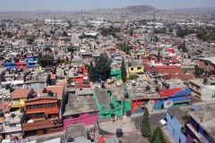 Utsikten från världens längsta (10,55 km) linbana för kollektivtrafik, linje 2 mellan Constitución de 1917 och Santa Marta, Mexico City.