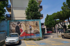 Graffiti längs Viale Tiberio, Rimini.