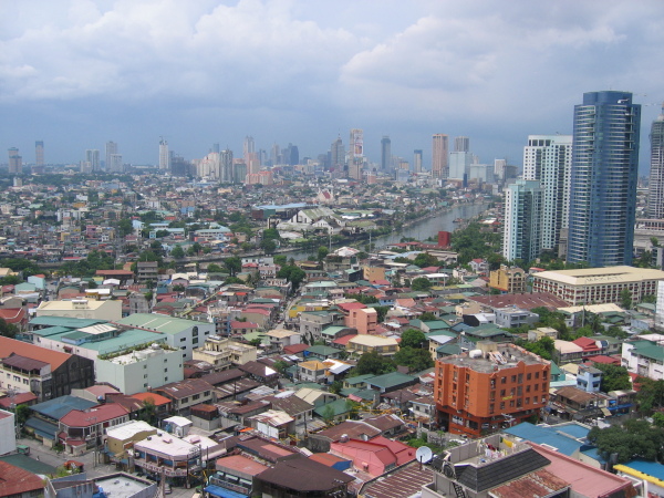 Utsikt över en del av jättestaden från mitt hotellrum, Makati, Manila.